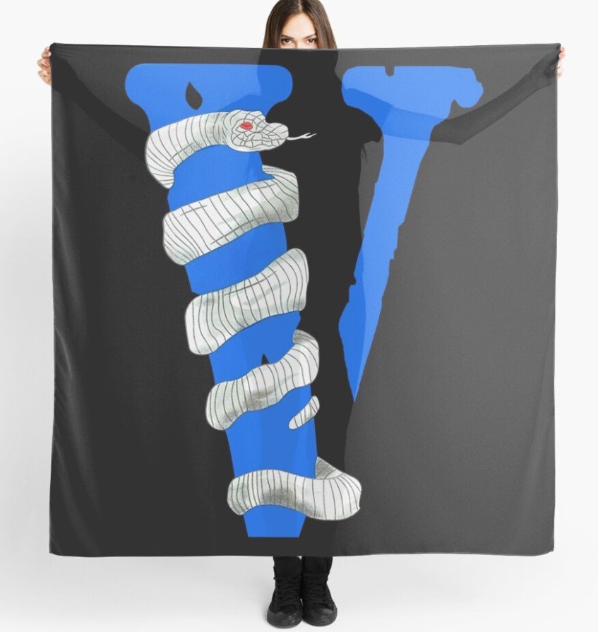 "Vlone Friends Snake Staple Scarf: A close-up view of the trendy snake print design on a high-quality fashion accessory."