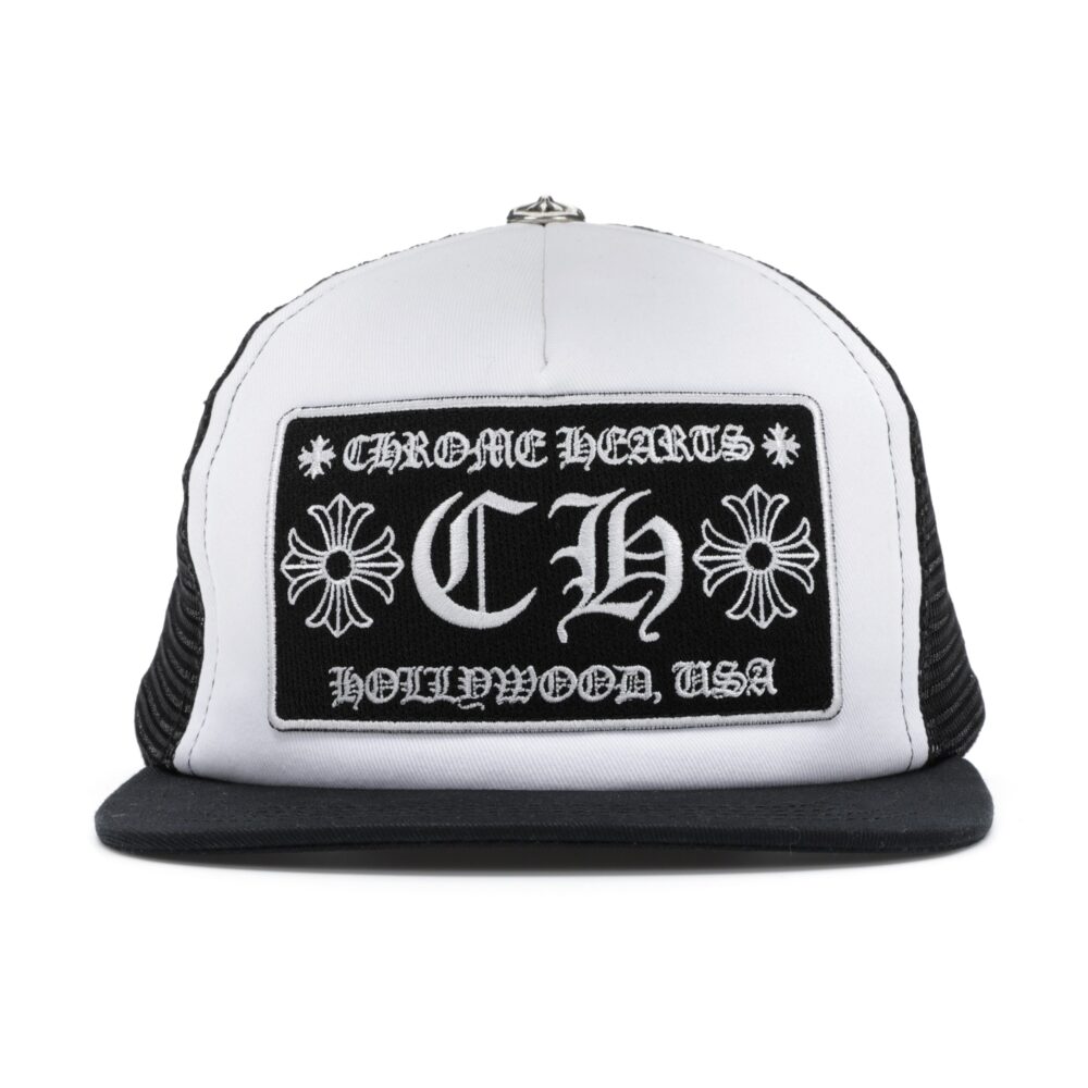 "A stylish Black and White Chrome Hearts CH Hollywood Trucker Hat with the iconic Chrome Hearts logo."